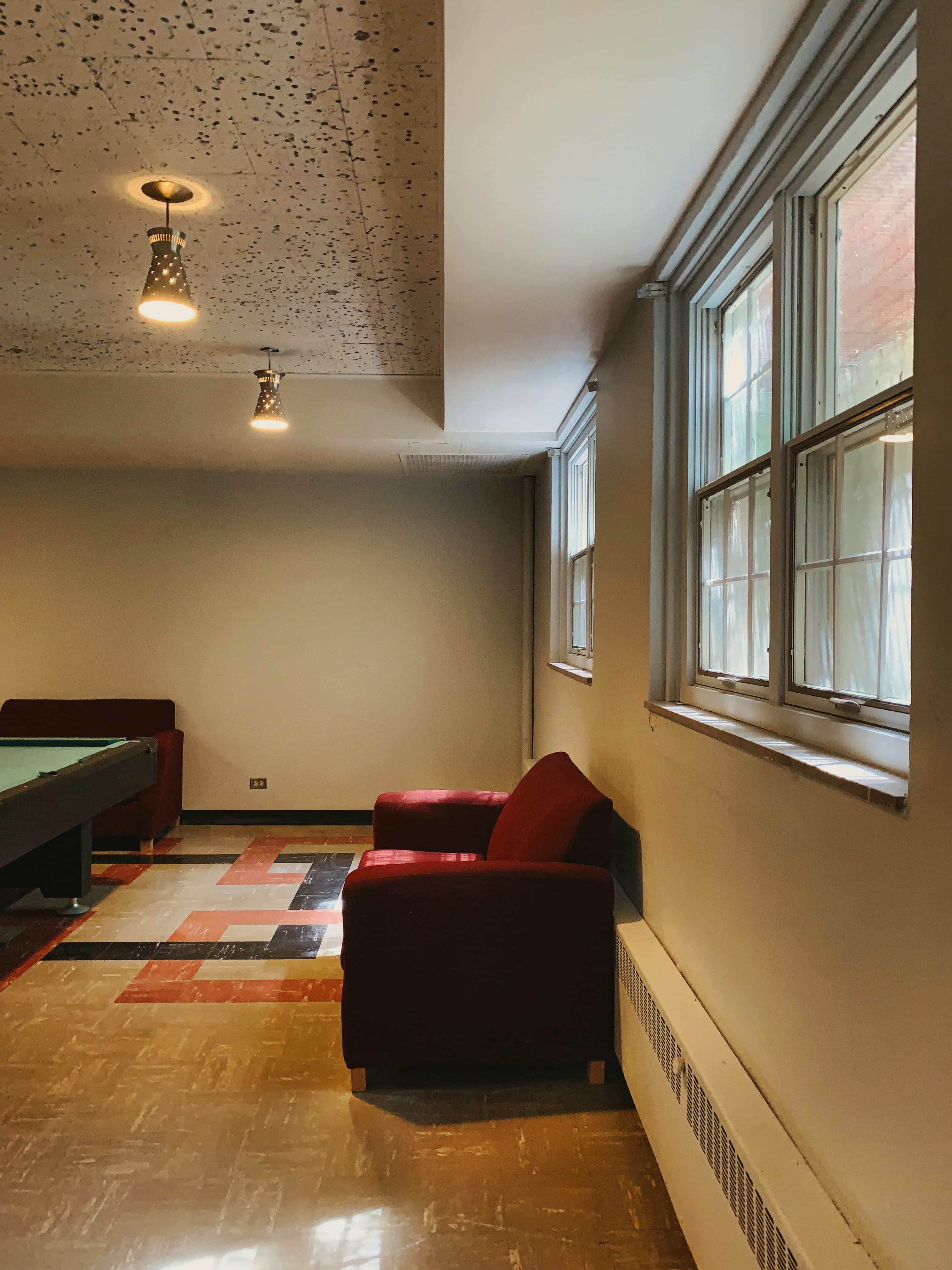 Shared common room with sofas and a pool table